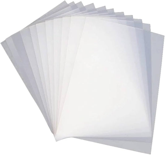 A pack of 100 American DTF Supply A3 instant peel DTF transfer sheets, 12x16 inches, spread out flat for printing.